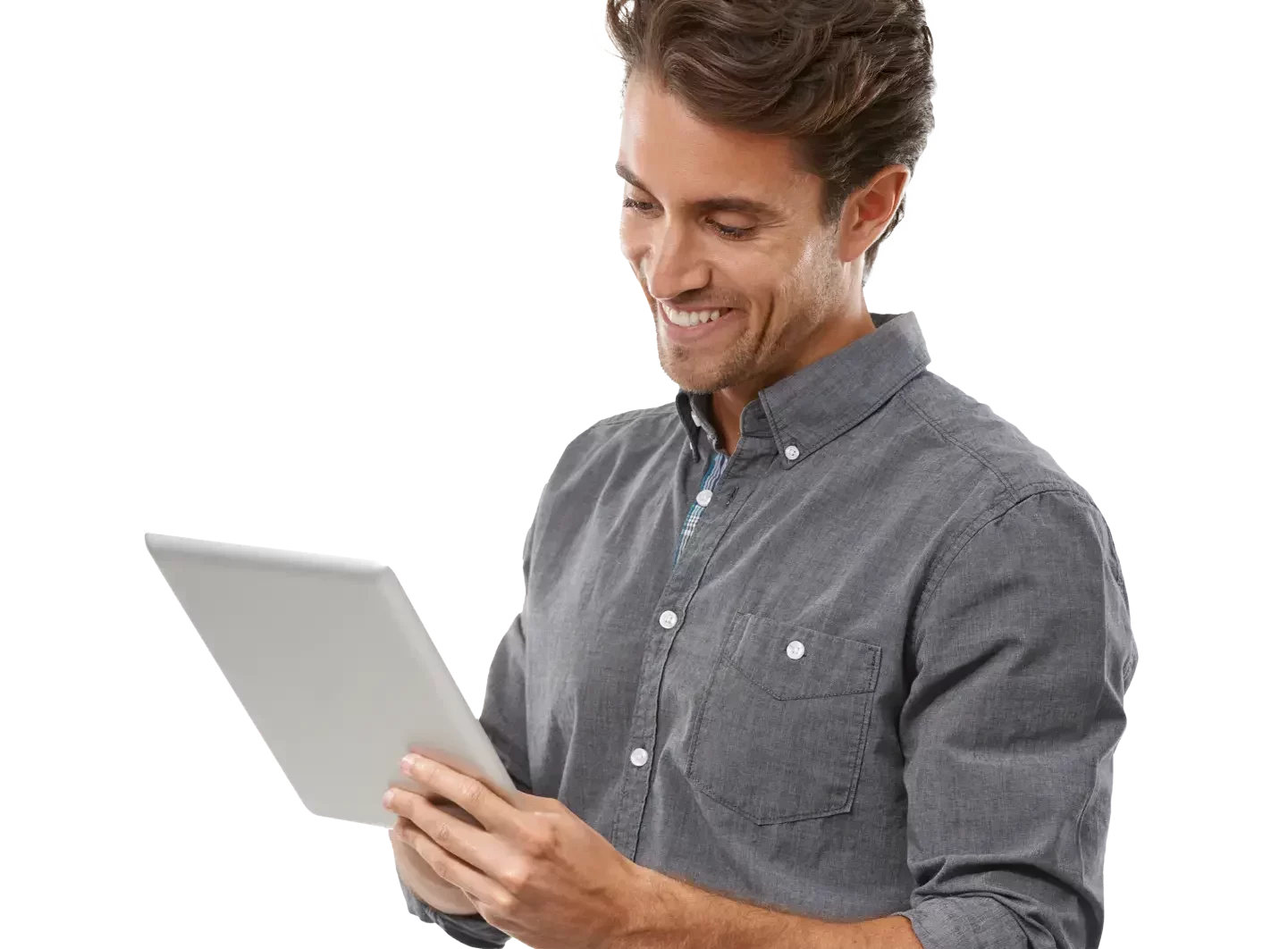 Man in a button up shirt holding a digital tablet and smiling
